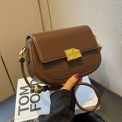 Maza soma ar magnētisku sprādzi un plecu rokturi