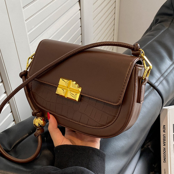 Maza soma ar magnētisku sprādzi un plecu rokturi