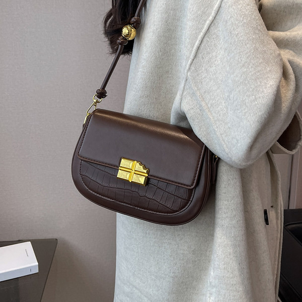 Maza soma ar magnētisku sprādzi un plecu rokturi