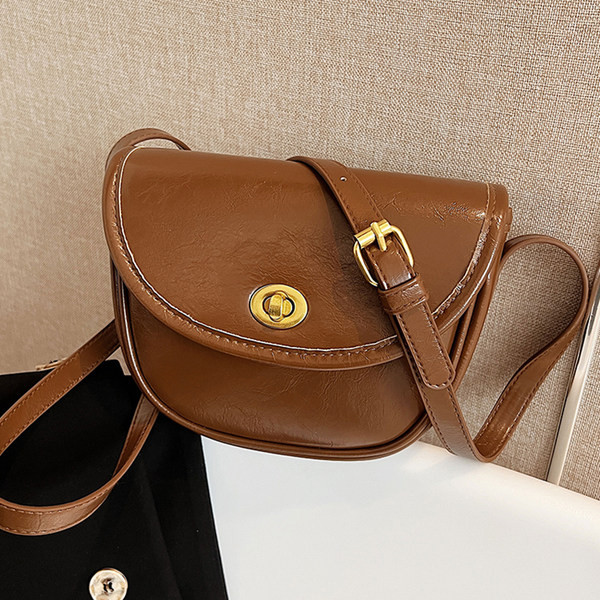 Rokassomiņa ar - metāla aizdari