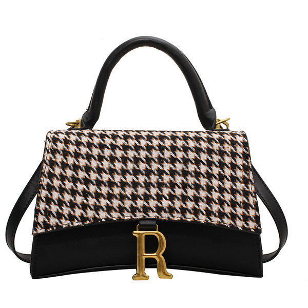 Moderna ženska torba od eko kože sa metalnim elementom