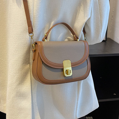 Rokassomiņa ar - metāla aizdari vairākās krāsās