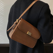 Casual γυναικεία δερμάτινη τσάντα με μεταλλικό κούμπωμα