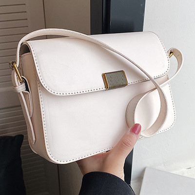 Casual γυναικεία δερμάτινη τσάντα με μεταλλικό κούμπωμα