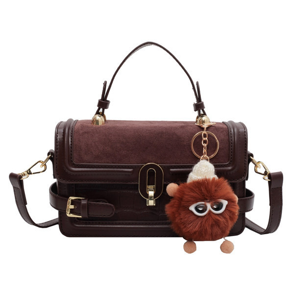 Torbica - s velikom ručkom i metalnim elementima