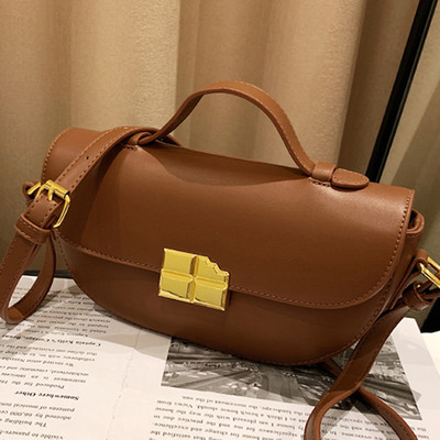 Novi model ženske kožne torbe sa metalnom kopčom