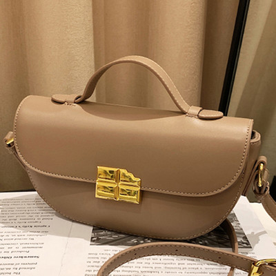 Novi model ženske kožne torbe sa metalnom kopčom