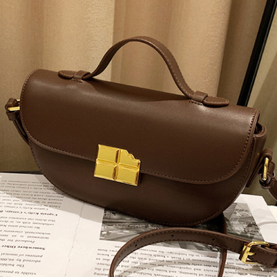 Novi model ženske kožne torbe sa metalnom kopčom