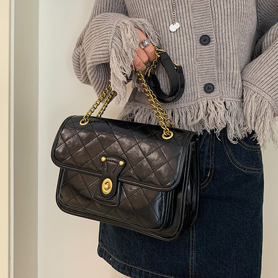 Női bőrtáska - fém fogantyúval, három színben