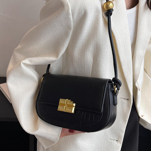 Stilīga rokassomiņa no eko ādas ar metāla aizdari, jauns modelis