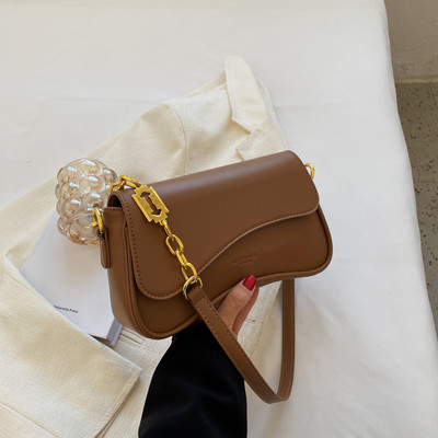 Jauna modeļa ādas rokassomiņa