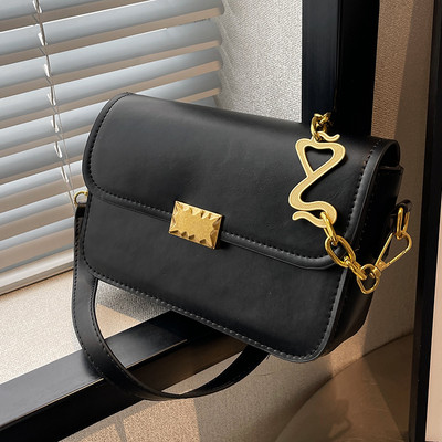 Rokassomiņa ar - metāla rokturi