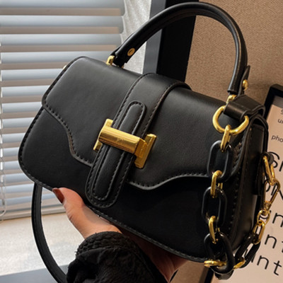 Moderna torbica s dvije ručke za rame od umjetne kože