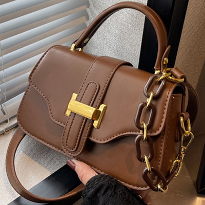 Moderna torbica s dvije ručke za rame od umjetne kože