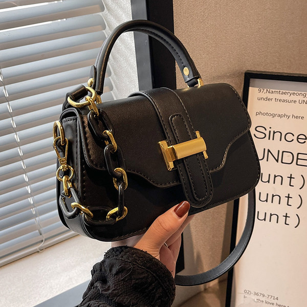 Moderna torbica s dvije ručke za rame od umjetne kože