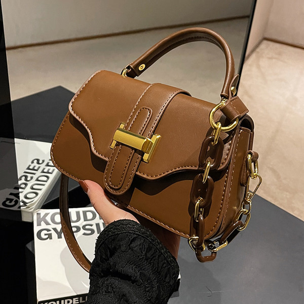 Moderna torbica s dvije ručke za rame od umjetne kože