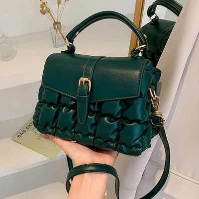 Női bőr táska fogantyúval