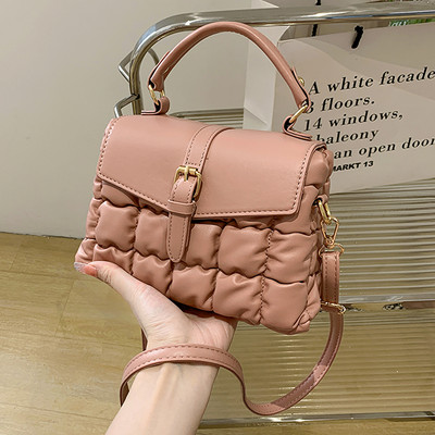 Női bőr táska fogantyúval