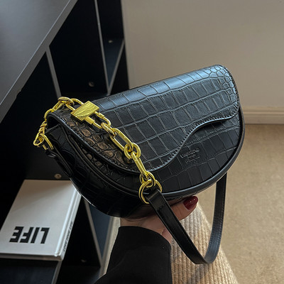 Moderna rokassomiņa no eko ādas melnā un brūnā krāsā