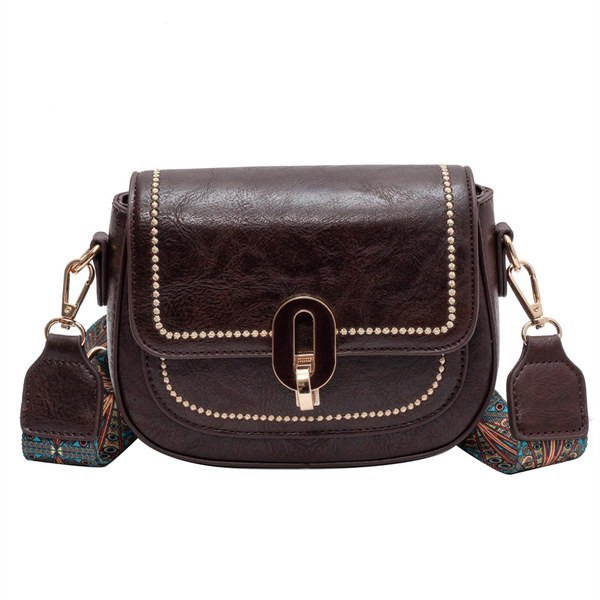 Ručna torbica sa širokom ručkom za rame i patentnim zatvaračem