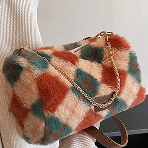 Sieviešu plīša soma ar metāla rokturi