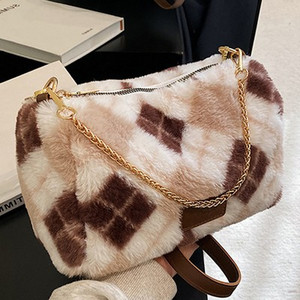 Sieviešu plīša soma ar metāla rokturi