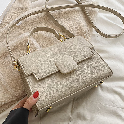 Moderna sieviešu ādas soma ar diviem rokturiem