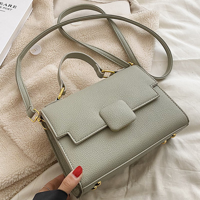 Moderna sieviešu ādas soma ar diviem rokturiem