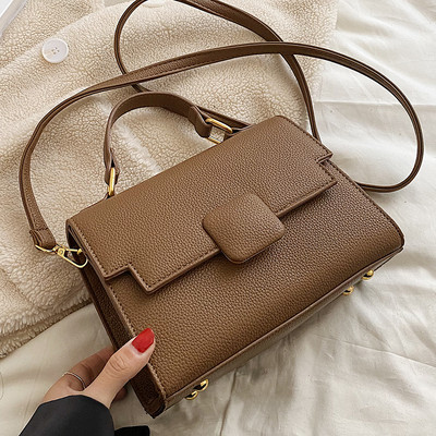 Moderna sieviešu ādas soma ar diviem rokturiem