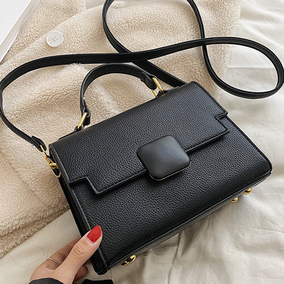 Moderna sieviešu ādas soma ar diviem rokturiem