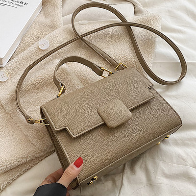 Moderna sieviešu ādas soma ar diviem rokturiem