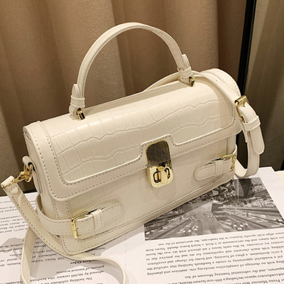 Új modell bőrtáska fém csattal női többféle színben