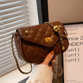 Moteriškas dygsniuotas krepšys su metaliniu užsegimu