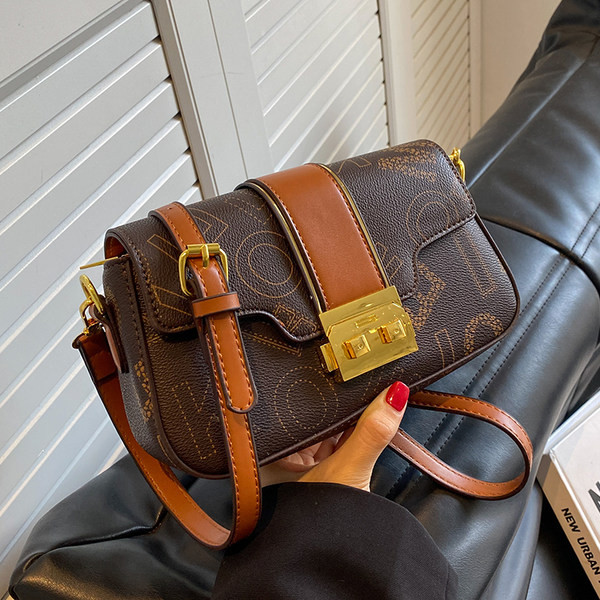 Női eko bőr alkalmi táska nyomattal és cipzárral