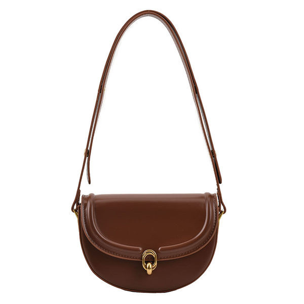 Stílusos női bőr táska fém csattal