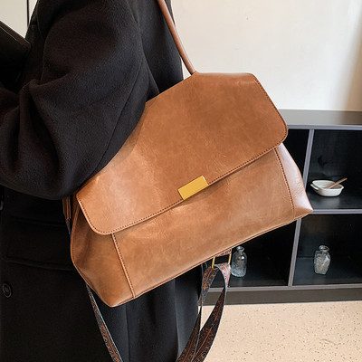 Rokassomiņa ar garu rokturi