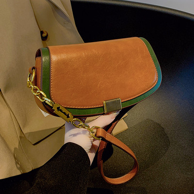 Moderna ženska torba s dugom ručkom i metalnom kopčom