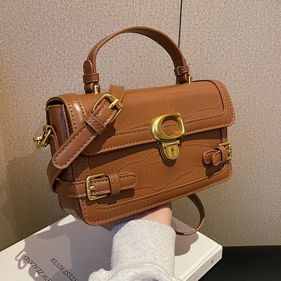 Rokassomiņa ar metāla elementu un garu rokturi, jauns modelis