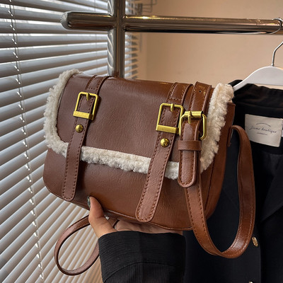 Moderna rokassomiņa ar sprādzēm vairākās krāsās