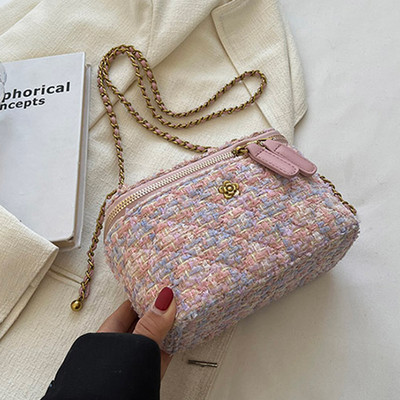 Eleganta rokassomiņa ar rāvējslēdzēju un metāla elementiem