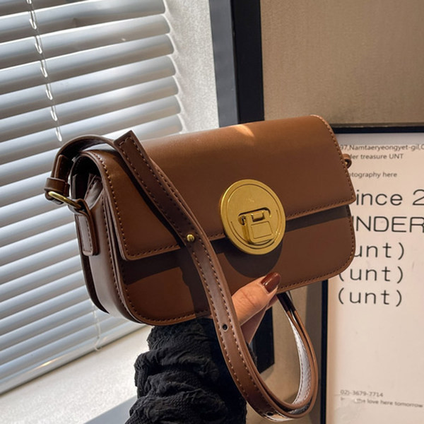 Rokassomiņa - ar sprādzi četrās krāsās