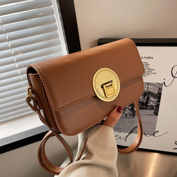 Rokassomiņa - ar sprādzi četrās krāsās