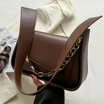 Elegantne metallist sangaga naistekott