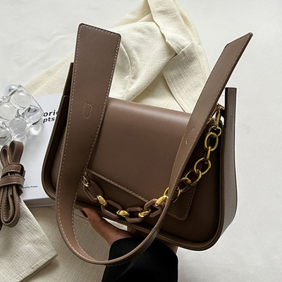 Elegantne metallist sangaga naistekott