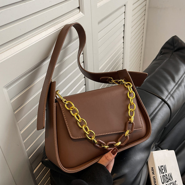 Elegantne metallist sangaga naistekott