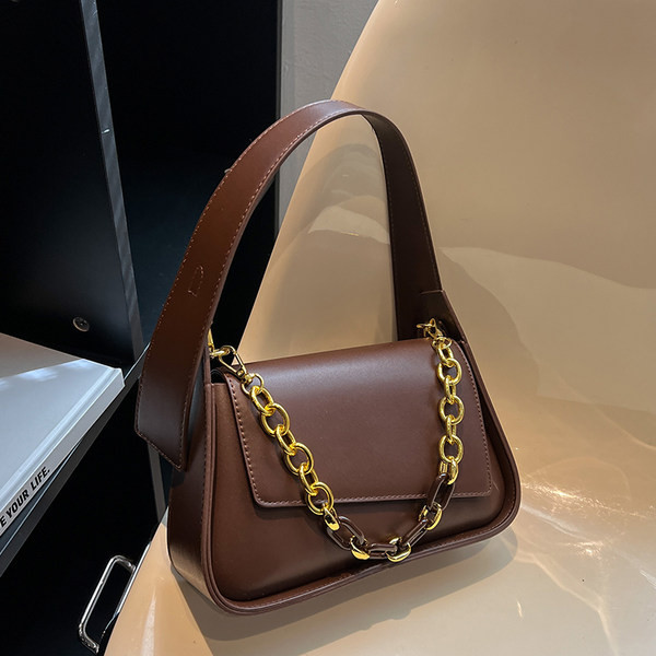 Elegantne metallist sangaga naistekott