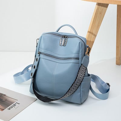 Női hátizsák hosszú fogantyúval és zsebbel