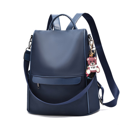 Дамска кожена раница с ключодържател и цип