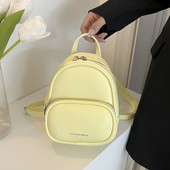 Jednobojni ženski ruksak od eko kože sa džepom i patentnim zatvaračem