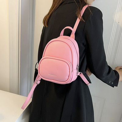 Jednobojni ženski ruksak od eko kože sa džepom i patentnim zatvaračem